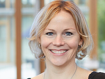 Wibke Borgstede LHIND Friendly smiling woman with medium-length blonde hair and blue eyes